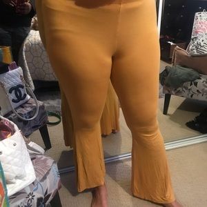 Stretchy yellow bell bottoms